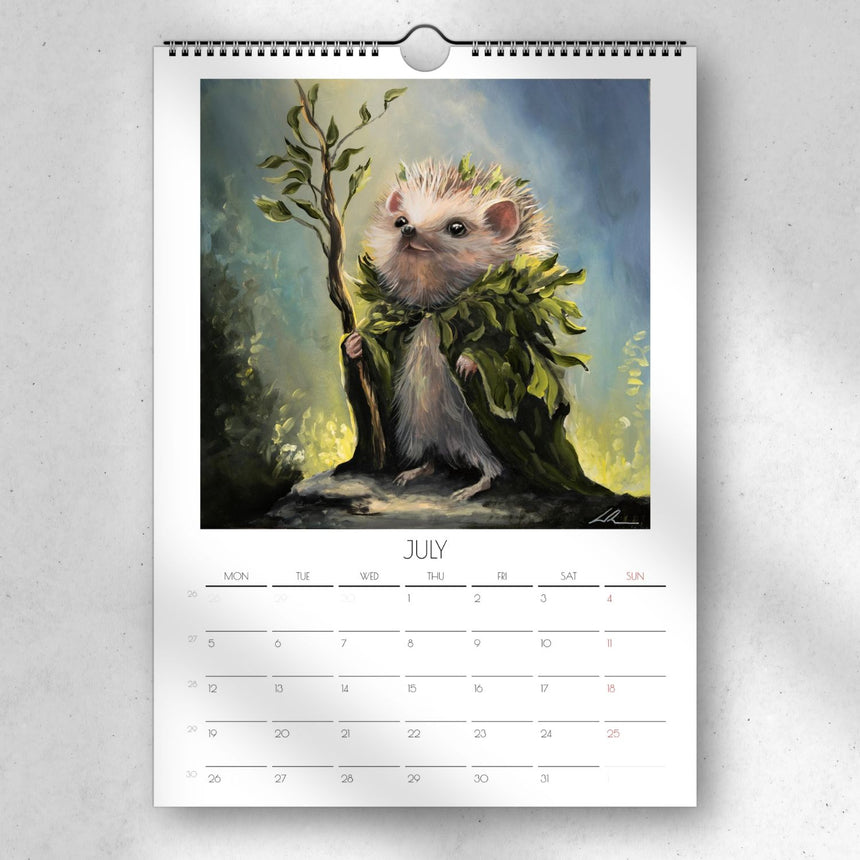 Tiny Adventurers 2027 wall calendar featuring traditional art, a July page, and a sturdy metal hanging hook