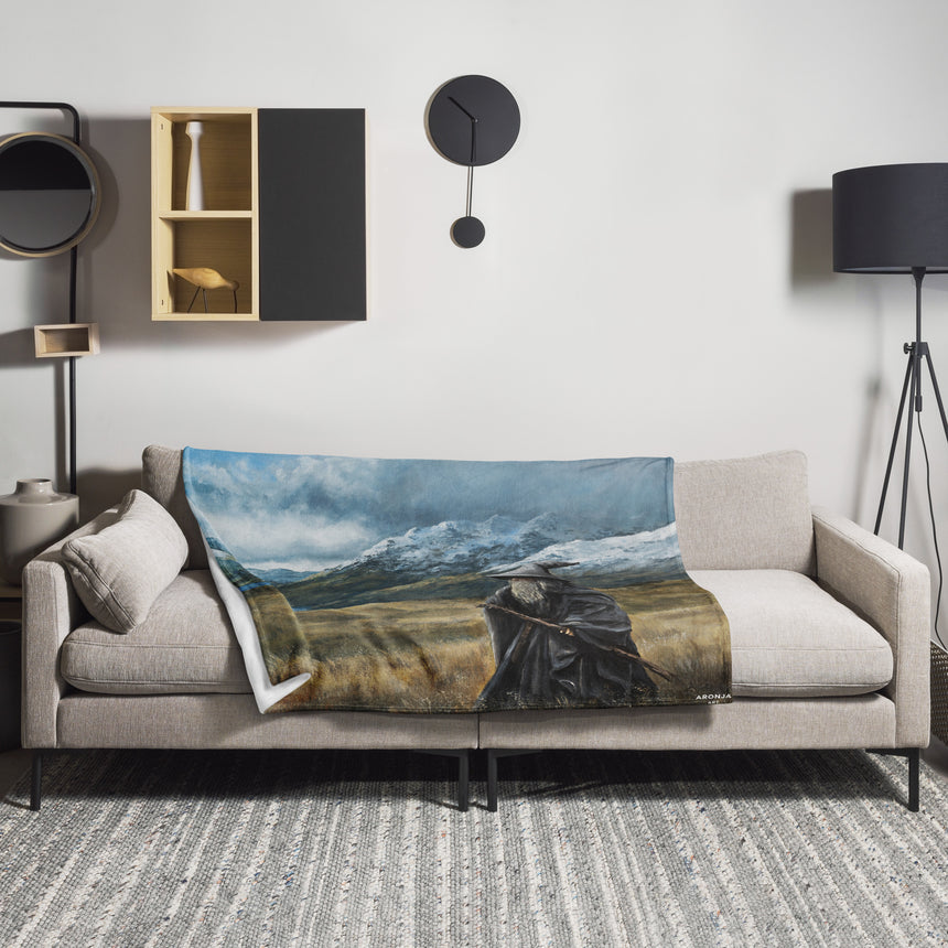 The Grey Wizard - Blanket blue and white fantasy art throw blanket on a couch with mountains scene