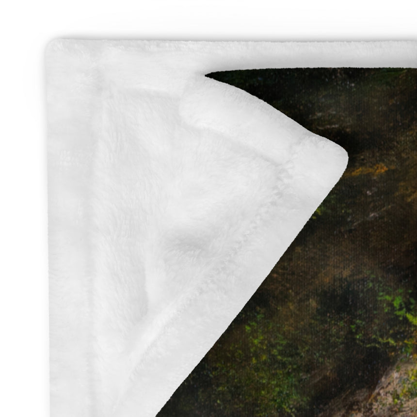 The Bridge - Blanket white and dark green throw with textured fabric and a sharp edge seam in view