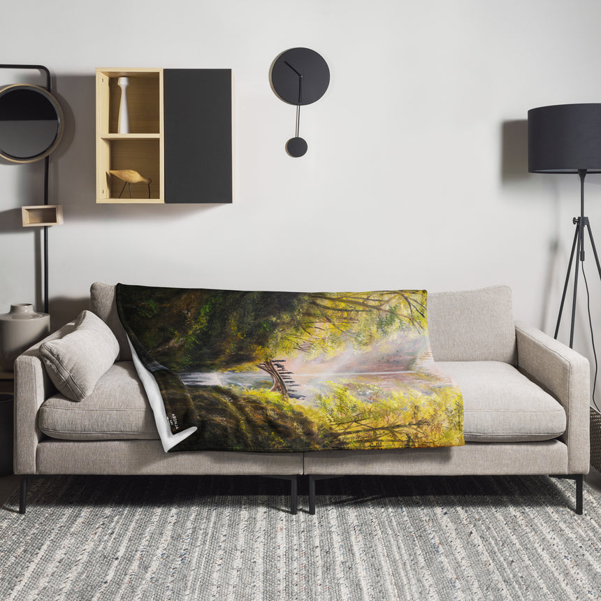 The Bridge - Blanket fantasy art throw with lush green and gold scene on a sofa cushion