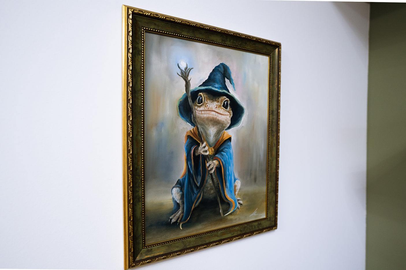 LizwardWizard framed oil painting (30x40cm) depicts a whimsical lizard wizard in a blue cloak and hat holding a staff, hand-painted by a fantasy artist inspired by gaming and nature.