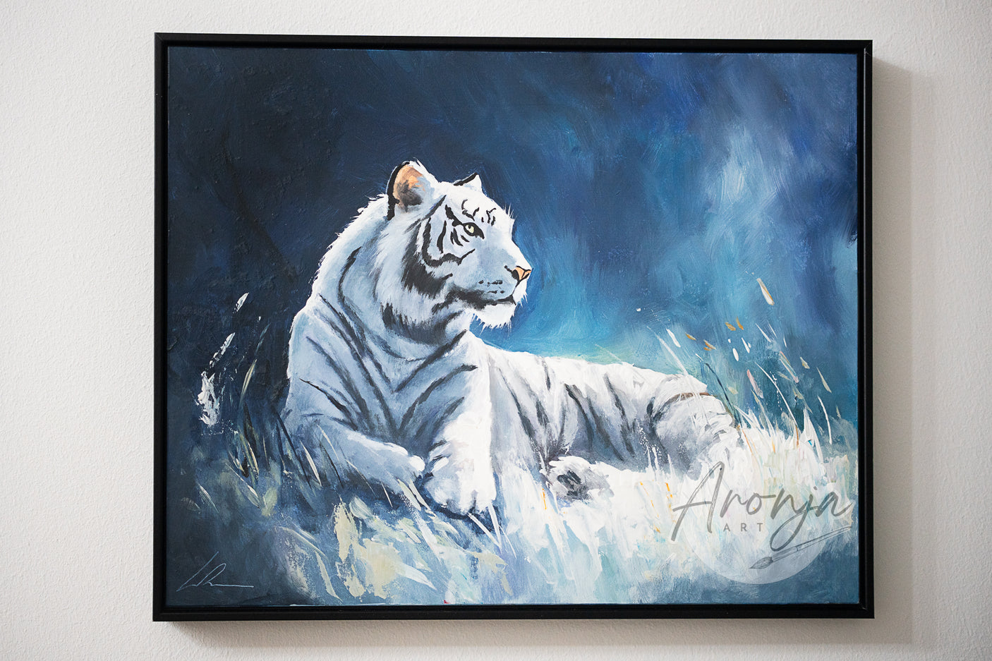 White Tiger - Framed Acrylicpainting showcasing a hand-painted traditional fine art piece of a majestic white tiger resting in a mystical blue-toned landscape by a fantasy artist.