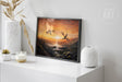 Dance Of The Dragons (Print) displayed on a white shelf, showcasing hand-painted fantasy art of dragons flying over a mystical landscape at sunset, with warm orange tones.