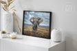 Framed fine art print titled Elephant (Print) featuring a detailed hand-painted elephant standing in a natural landscape, displayed on a white surface with minimalist decor.