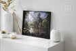 At the Edge of the Forest (Print) showcases a detailed fantasy landscape with towering trees, a flowing river, and majestic mountains in the background, evoking a mystical and serene atmosphere.