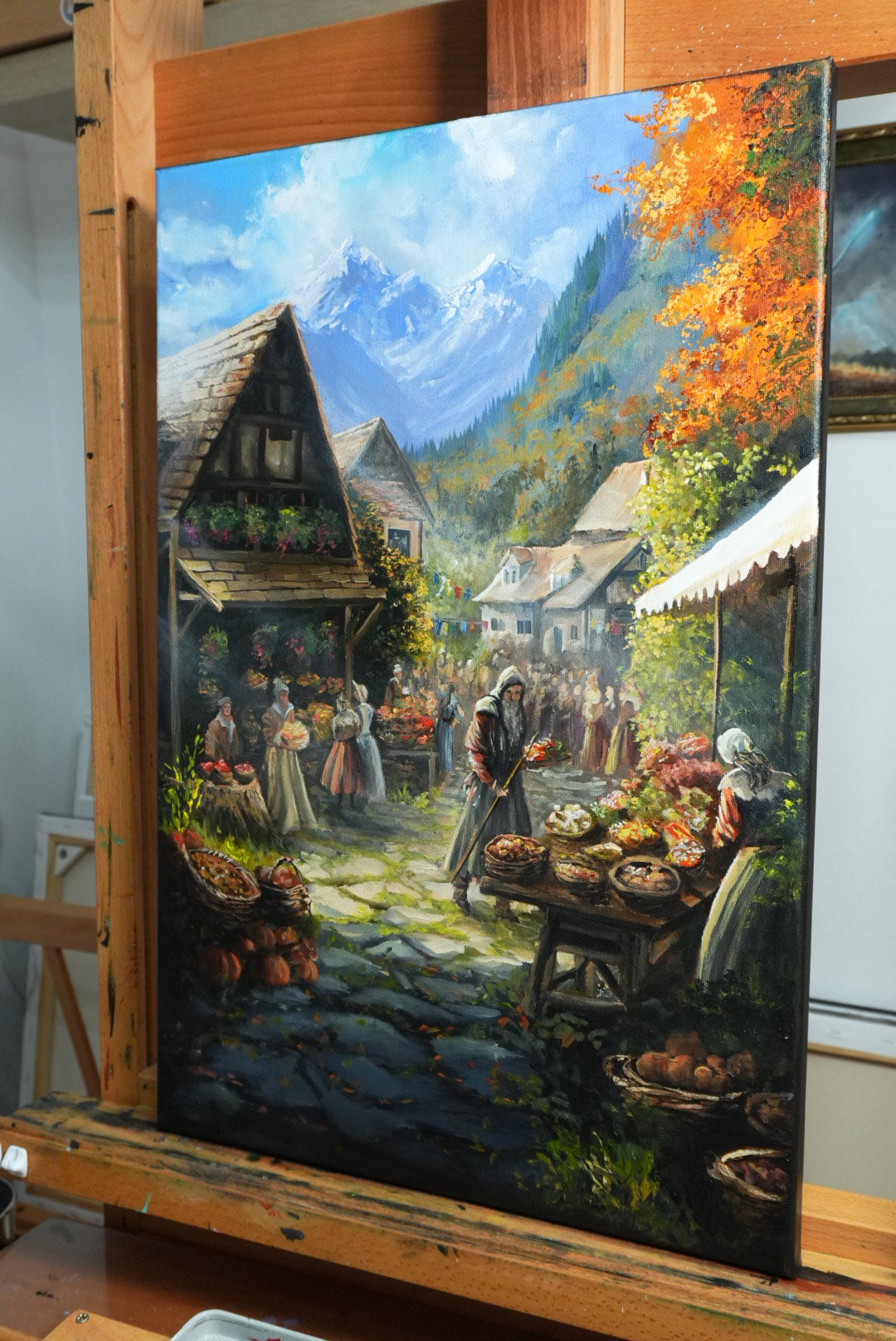 SORCERY Gothic Original Painting "Harvest Festival" - 60x40cm / Acrylics depicts a hand-painted autumnal village scene with villagers gathering at a lively market, set against a mountainous landscape. Fantasy and gaming art inspired by Lord of the Rings, Sorcery TCG, and nature.