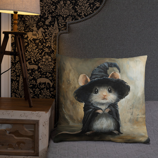 Mouse Wizard - Pillow featuring a charming hand-painted fantasy art design of a small mouse dressed as a wizard with a hat and cloak, set against a muted background.