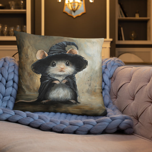Mouse Wizard - Pillow featuring a fantasy art design of a small mouse wearing a black wizard hat and cloak, set against a mystical background with a cozy home interior.
