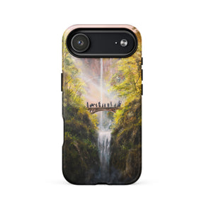 Crossing the Bridge - MagSafe® tough case for iPhone® by Aronja-Art, forest bridge scene in warm sunset tones.